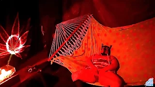 Getting frisky in a camp-ground fingering her wet hole in a hammock